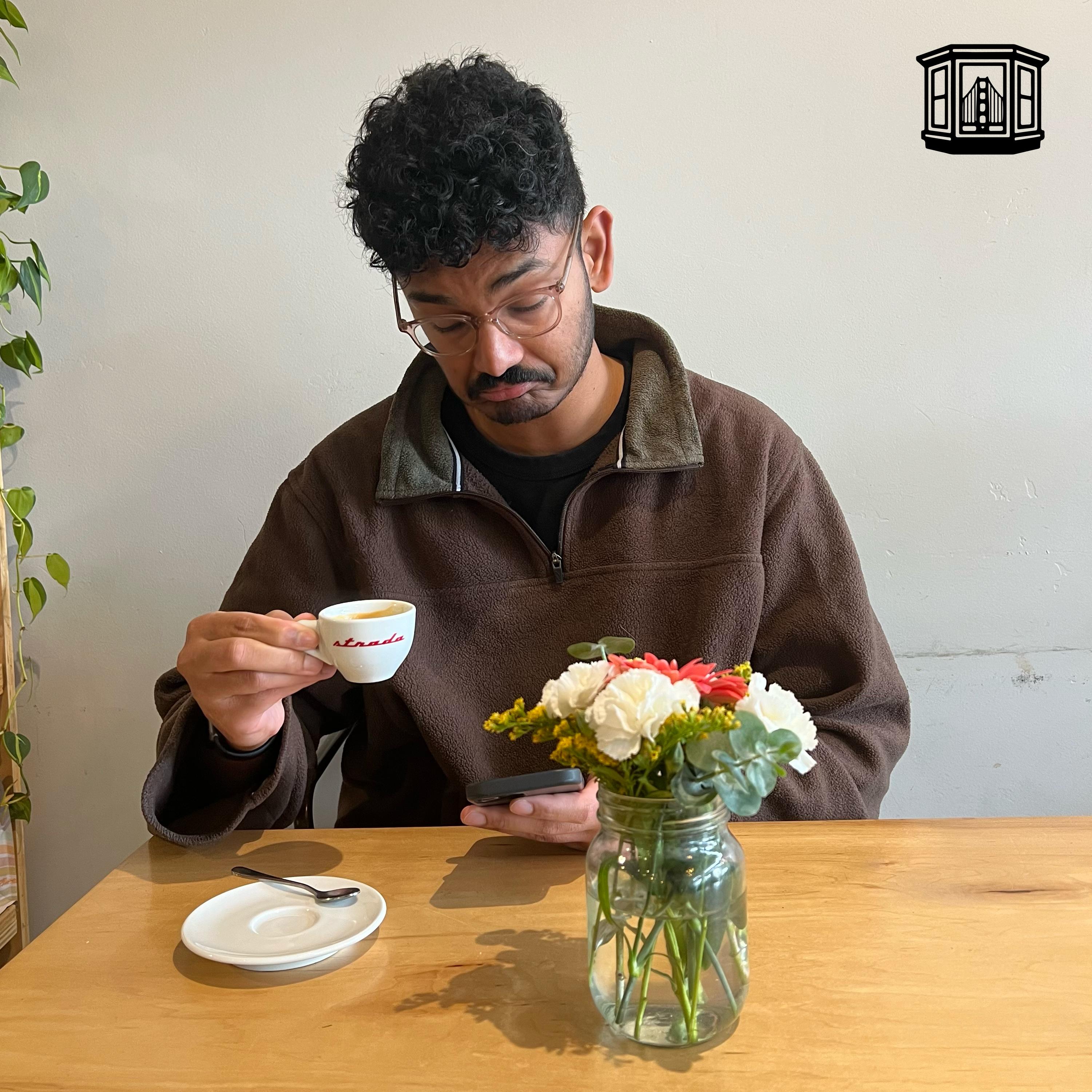 Arvind enjoying Bay Window Coffee